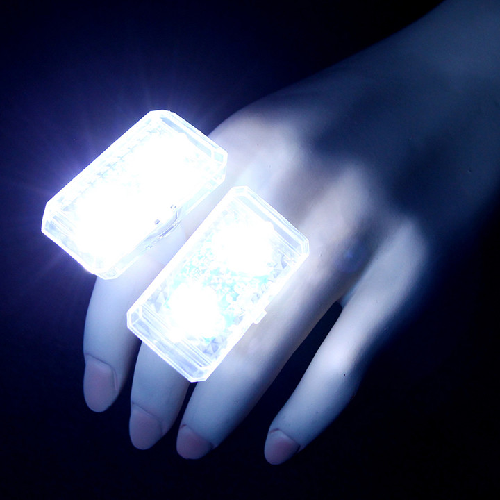 LED rings promotional items glowing at concert
