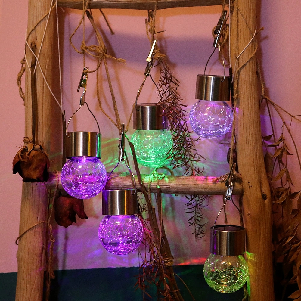 Solar-powered LED lights decorative jar on pathway