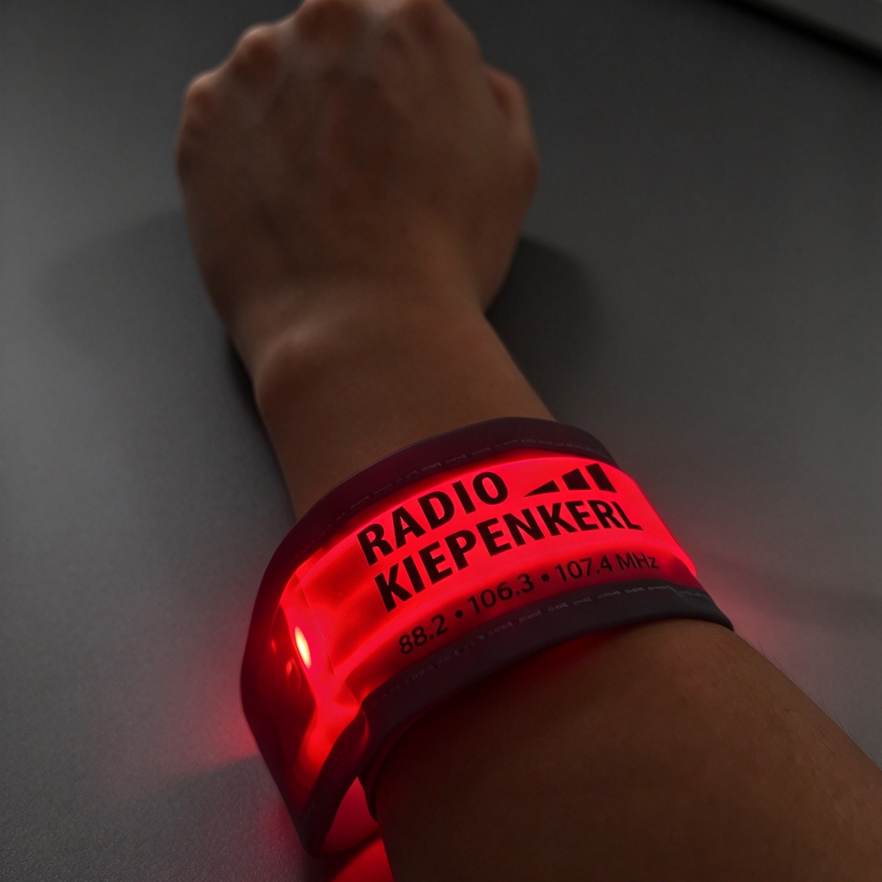 Reflective LED arm band worn on ankle for night running